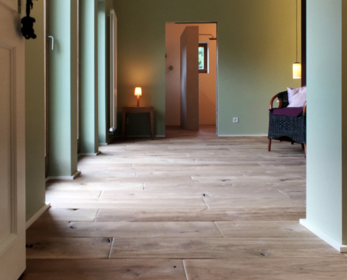 Neubau – Eiche Mühlenboden Farbton Gerste Massivholzdiele